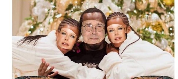 Chevy Chase’s Family 2021 Christmas Photo with the two family dogs pooing