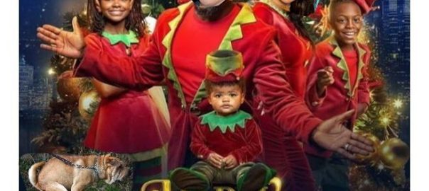 Mike Judge and Whitney Cummings Family Christmas 2021 Picture with the family dog pooing